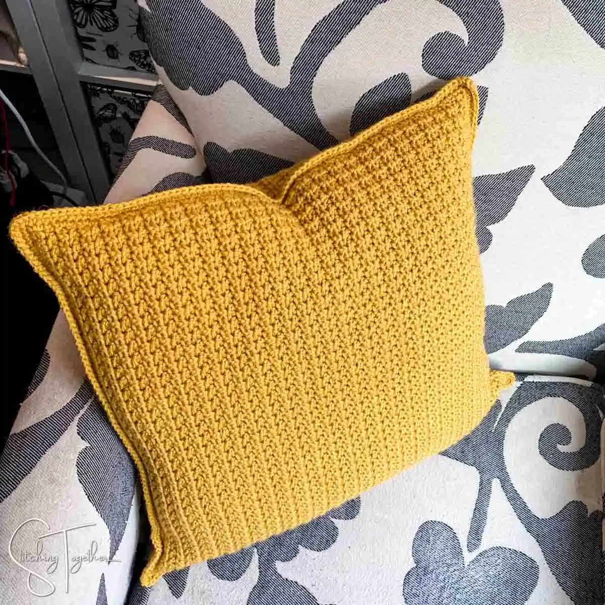 https://www.stitching-together.com/wp-content/uploads/2022/10/textured-crochet-pillow.webp